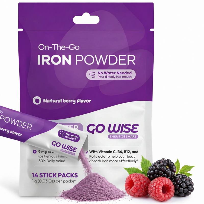 Go Wise On-The-Go Iron Powder, a gentle iron supplement and iron powder supplement in natural berry flavor with no water needed, shown with a poured stick pack, berry powder, and fresh berries. A good iron supplement for women seeking iron supplements for energy and iron supplements for fatigue.