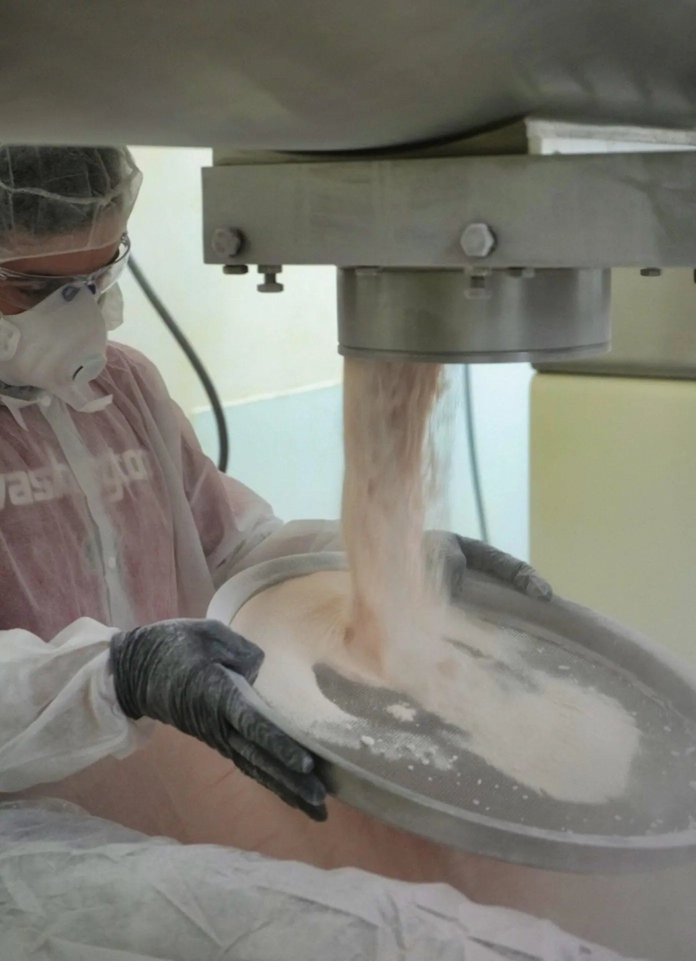 Go Wise production powder being handled in a clean manufacturing environment
